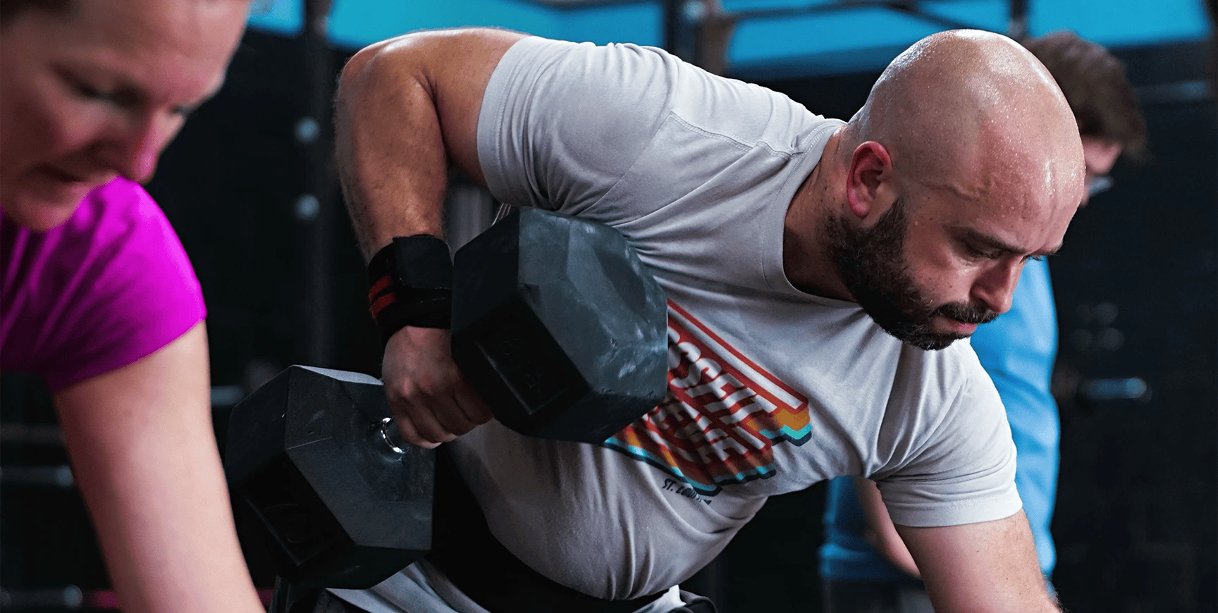 man lifting weights at CrossFit Achieve